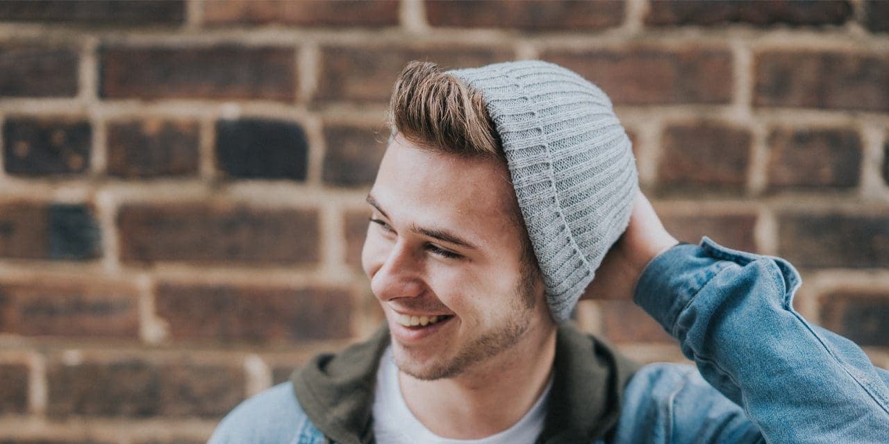 happy guy wearing a bonnet